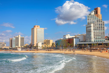 Mediterranean Sea coastal area in Tel Aviv, famous tourist and recreation city in Israel  Sunny day on central public beaches. New embankment along the beach  