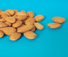 Almonds on a blue background