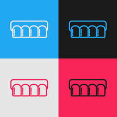 Color line Dentures model icon isolated on color background. Teeth of the upper jaw. Dental concept. Vintage style drawing. Vector Illustration © Oksana