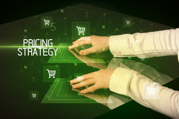 Online shopping with PRICING STRATEGY inscription concept, with shopping cart icons