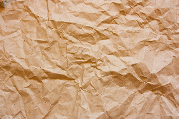 Obraz premium Brown crumpled paper texture. Kraft paper background.