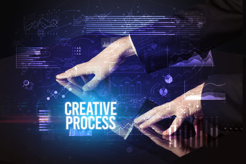 Businessman touching huge screen with CREATIVE PROCESS inscription, cyber business concept