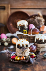 Holiday Easter cakes, hot cross buns and colorful painted eggs