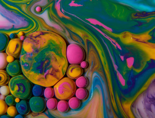 Bright and colourful abstract background from acrylic paints and oil