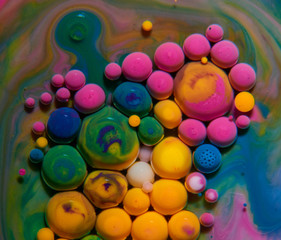 Bright and colourful abstract background from acrylic paints and oil