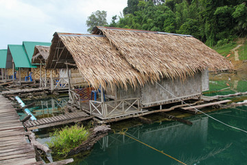 Fototapeta na wymiar The hut hay on raft in Cheow Lan Dam is vintage from rest at thailand