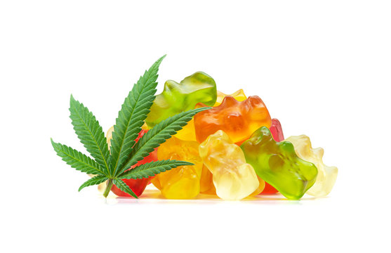 Gummy Bear Medical Marijuana Edibles, Candies Infused with CBD or THC, with Cannabis Leaf Isolated on White Background