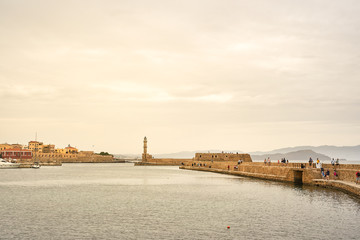 Fototapeta premium Chania, Crete, Greece. May 20: famous venetian harbour bay waterfront of Chania old town, Crete, Greece