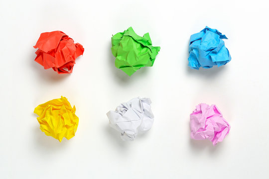 crumpled paper balls - Powered by Adobe