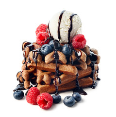 Belgium waffles with ice cream, chocolate sauce and fresh berries