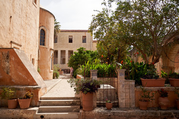 Agia Triad monastery in Crete in Greece. Patio with fruit trees