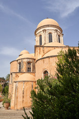 Fototapeta na wymiar Agia Triad monastery in Crete in Greece. Patio with fruit trees