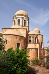 Fototapeta na wymiar Agia Triad monastery in Crete in Greece. Patio with fruit trees