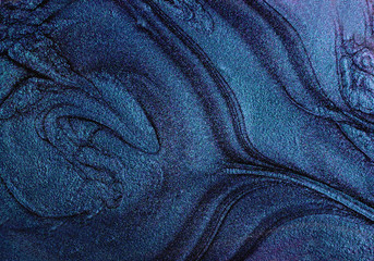 Fototapeta na wymiar Liquid texture of nail polish.Abstract background.Blue classic shade.