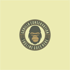 gorilla face with badge emblem logo design for animal conservation logo