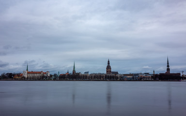 Fototapeta premium April 24, 2018 Riga, Latvia. View of the Old Town in Riga from the opposite bank of the Daugava River.