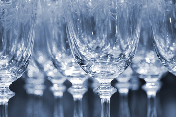 Rows of empty wine glasses in duo color version