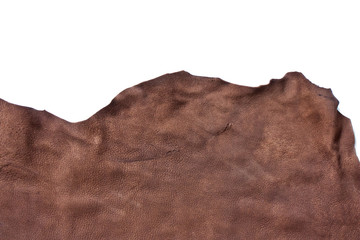 Piece of natural brown leather isolated on white background. Fine Leather Crafting, Handmade Leather handcrafted