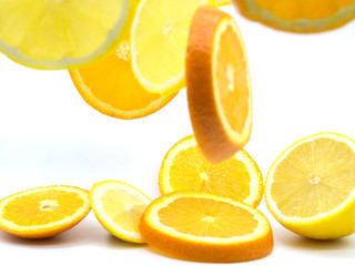 Fototapeta premium Set of ripe lemon and orange fruits isolated on white background.