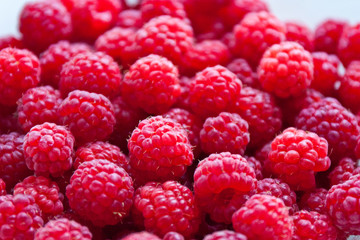 Fresh and sweet red raspberries background