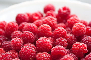 Fresh and sweet red raspberries background