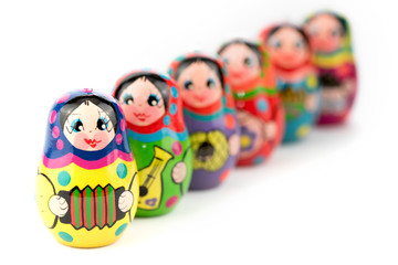 Fototapeta na wymiar traditional russian souvenir matryoshka, six babushka doll in a row