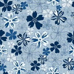 Blue tinted flowers of various sizes on a dotted background vector seamless surface pattern.