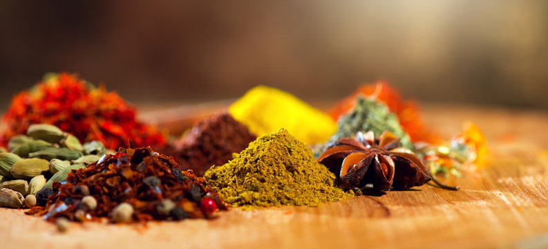 Spices. Various Indian Spices colorful background. Spice and herbs backdrop. Assortment of Seasonings, condiments. Cooking ingredients, flavor