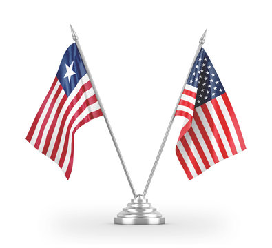 United States and Liberia table flags isolated on white 3D rendering