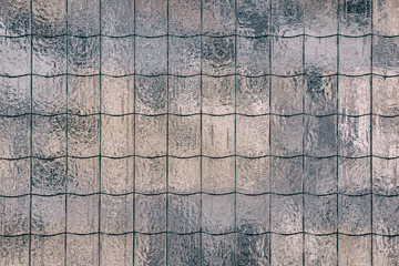 Background texture of frozen reinforced glass.