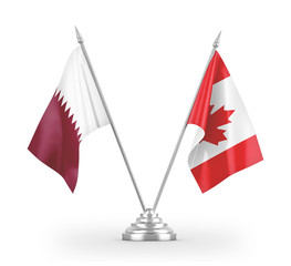 Canada and Qatar table flags isolated on white 3D rendering