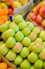 Various Fruits And Vegetables For Sale At Market Stall
