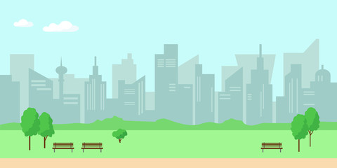 City landscape with buildings, trees and benches.