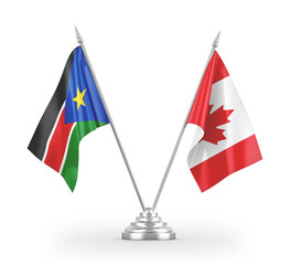 Canada and South Sudan table flags isolated on white 3D rendering