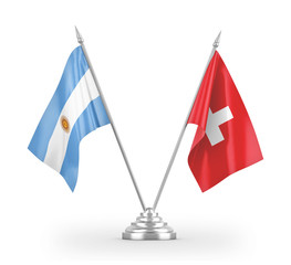 Fototapeta na wymiar Switzerland and Argentina table flags isolated on white 3D rendering