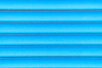 Background and texture of metal gates in blue