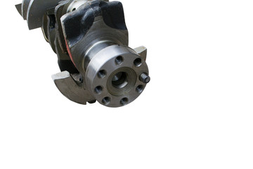 The crankshaft of the engine of the truck on an isolated white background.