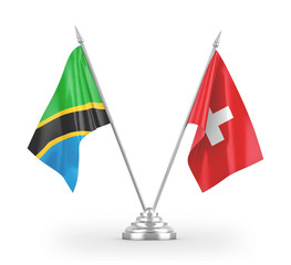 Switzerland and Tanzania table flags isolated on white 3D rendering