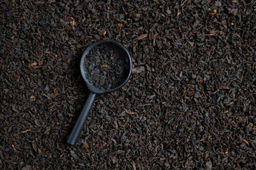 The concept of selection of premium tea segment. Magnifier.