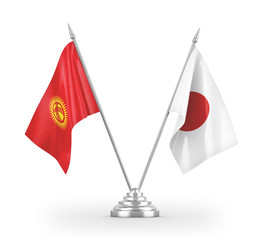 Japan and Kyrgyzstan table flags isolated on white 3D rendering