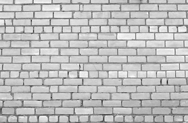 Brick wall in black and white. Beautiful aged photophone. Selective focus. Special treatment