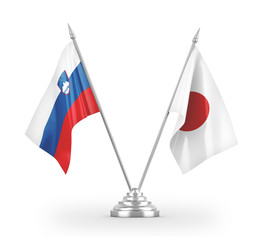 Japan and Slovenia table flags isolated on white 3D rendering