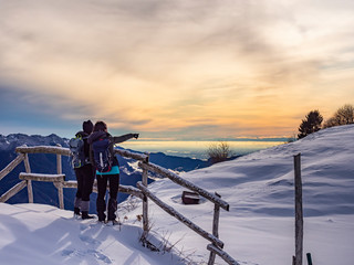 Admiring the alps at sunset in winter