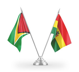 Bolivia and Guyana table flags isolated on white 3D rendering