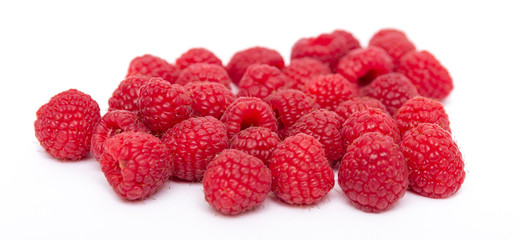 Sweet, healthy raspberries isolated on a white background. The concept of a healthy diet and natural organic products.