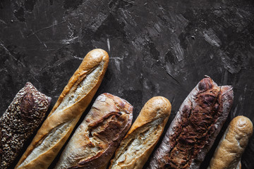 Baguette mix on a black background. French pastries, homemade.