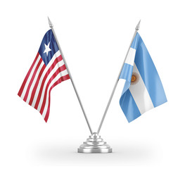 Argentina and Liberia table flags isolated on white 3D rendering