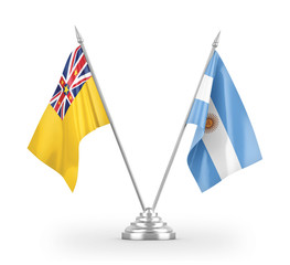 Argentina and Niue table flags isolated on white 3D rendering