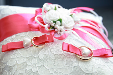 Wedding rings on the pillow