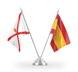 Spain and Jersey table flags isolated on white 3D rendering